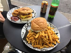 Tiny Tempeh meal deal (£5, left) and Tainted Soul burger and herby fries (£10, right). at Sowl Fuud in Gloucester