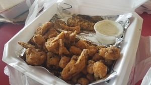 Lemmon pepper wings are amazing with cauliflower chicken. at Cool Al's in Jackson