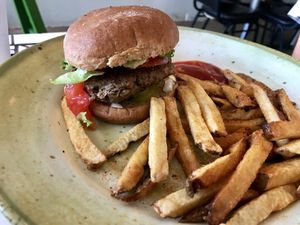 Impossible burger with Cajun seasoned fries. SO good! at Cool Al's in Jackson