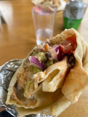 Vegan burrito with cheese. Enormous, saucy, and delicious!  at The Nat Shack - Food Truck in Valdez