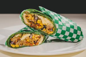 WRAP Colombiano This comes with tender corn, black beans, guacamole, hogao, lettuce muzclum, low fat cheese, ripe plantain and quinoa, you can add if you want chicken or Turkey ham at Green Kitchen in Cartagena