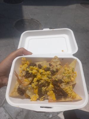 Half portion of nachos. Great crunchy nachos! at O Burrito in Coimbra