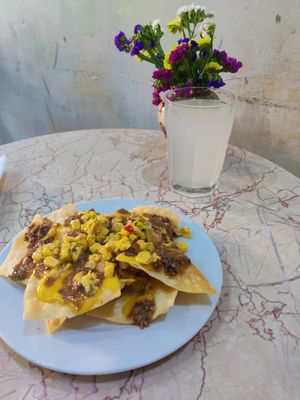 Half a portion of nachos at O Burrito in Coimbra