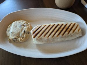 Tex Mex Wrap and vegan chocolate chip cookie at NovelTea Coffeehouse & Bakery in Truro