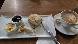 Vegan scone with soya spread, latte with soya. at Fletcher's House in Rye