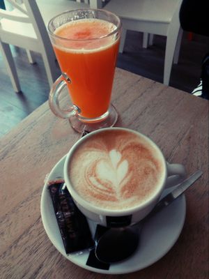 Coffee with oat milk and orange juice at Top Coffee Shop in Cadiz