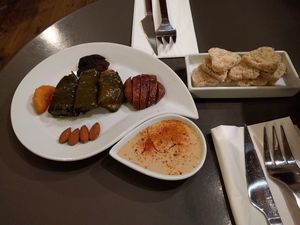 Adam's Green Sweets : Vine rolled leaves filled with rice served with lebanese sesame cream with Québec maple syrup,  soft dried fig, dried apricot and almonds,  at Keck's Cafe Nature Shop in Vichy