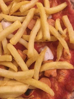 pizza with vegan chees and vegan wurstel and fries at Al Carmine in Padua