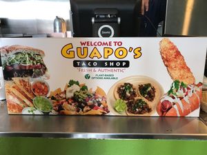 Sign publicizing plant based menu at Guapo's Taco Shop in Bakersfield