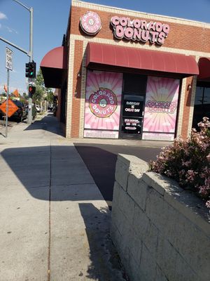 Front in small shopping center at Colorado Donuts in Los Angeles