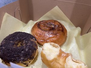 Glazed, Oreo, and Cinnamon roll donuts  at Colorado Donuts in Los Angeles