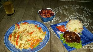 Udon noodles, salad and seitan steak with rice at cHelloVegi in Kampot