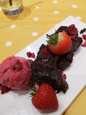 Vegan brownie with raspberry sorbet! at Pablos Bistro in Bradford-on-avon