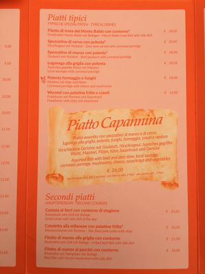 Vegan and vegetarian options clearly marked on the menu at La Capannina in Malcesine