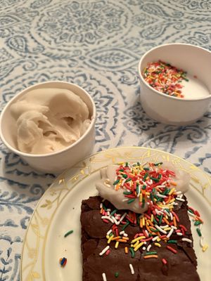 Vanilla soft serve with rainbow sprinkles. The brownie is from the black dog cafe😄 at Ben & Bill's Chocolate Emporium in Oak Bluffs