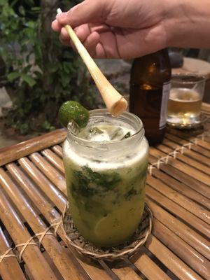 Cocktail with citronella straw at Lotus Restaurant in Phu Quoc