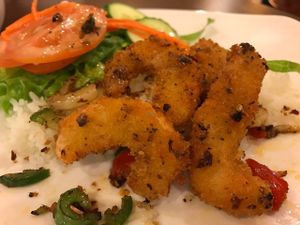 Spicy Cha Cha. Crispy fried vegan battered shrimp in spicy sauce. Great taste and texture, flavor explosion. We've already ate half in this picture. Our family's most favorite!  at Goji Cafe in Dallas