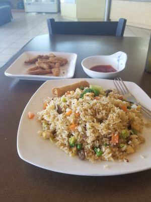 Happy times at Goji with Happy fried rice and Strips! at Goji Cafe in Dallas