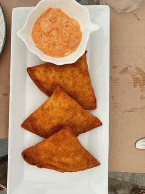 Vegetable Samosas with dipping sauce at Pulse in Crete