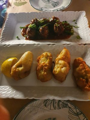 Manchuria balls and beer battered cheese stuffed zucchini flowers   at Pulse in Crete