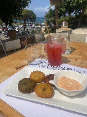 Trio of colours potato cakes with spicy mayo & cherry carafe (all tasted different!)  at Pulse in Crete
