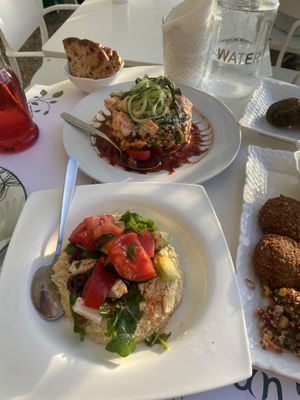 Hummus with Greek salad + whole foods salad   at Pulse in Crete