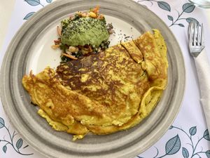Omelet filled with spinach and tomatoess  at Pulse in Crete