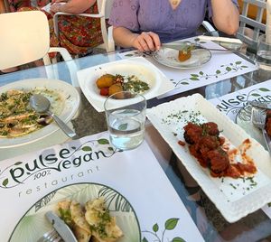 starters - mushroom carpaccio, polenta triangles, vegan meatballs  at Pulse in Crete