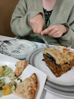 Moussaka and green goddess whipped feta dip at Pulse in Crete