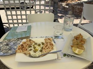 Tzatziki with pita and zucchini in beer batter.  at Pulse in Crete
