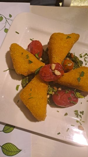 Polenta triangles with pesto at Pulse in Crete