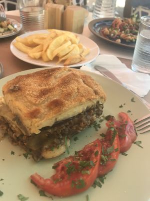Mousakka, chips and super food salad  at Pulse in Crete