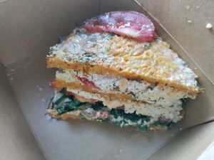 Carrot and corn flour 'lasagna' layered with dill tofu and fresh veg at Paradise Food in Budva