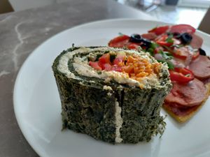 Spinach prepared in a way to make this refreshing scroll stuffed with tofu and fresh veg at Paradise Food in Budva