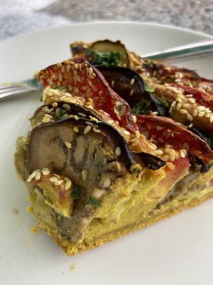 Vegetable quiche, eggplant, tomatoes and sesame seeds   at Paradise Food in Budva