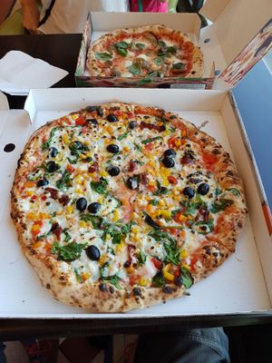 "The vegan" (vegan cheese) and "Bella" (regular cheese) at Neo's Pizza in Douglas