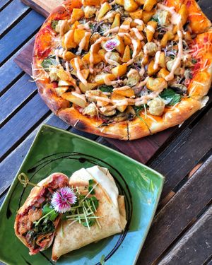 “Lamb” gyros $15 and Cajun chick’n pizza $18 at Doko Demo V in West Burleigh