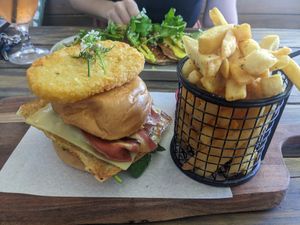 Breakfast burger with chips at Doko Demo V in West Burleigh