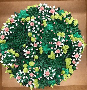 A full top of succulents at Cake Girl in Los Angeles