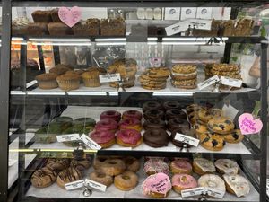 Display case of cookies, muffins, coffee cake and doughnuts   at Cake Girl in Los Angeles