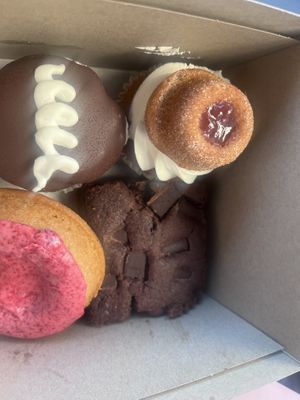 Churro donut, cream donut, brownie and hibiscus lemon donut.  at Cake Girl in Los Angeles