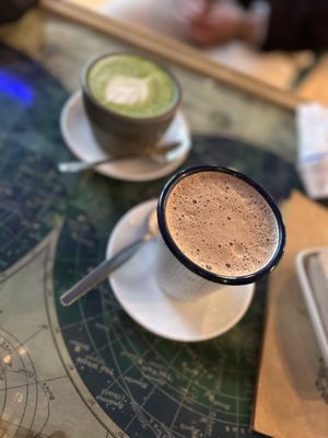 Cacao latte (front) matcha latte (back)  at La Tienda de Los Unicornios in Granada