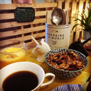 Make your own bowl of cereal! With oat or coconut milk or with soy yogurt (plain or with lemon), various grains and flakes to choose from and a wide array of toppings. Featured in the picture: puffed rice with chocolate and agave, oat milk, walnuts and cranberries. Seriously yummy! at La Tienda de Los Unicornios in Granada