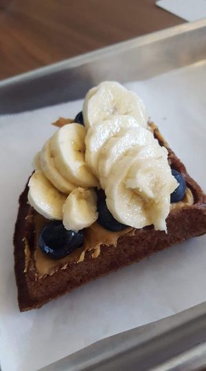 Chocolate vegan Mochi waffle with peanut butter, bananas and blueberries at The Game Parlor in San Francisco