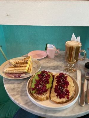 "Egg" sandwich, and avocado/hummus toast at Veg & Bake in Santiago