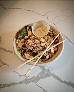 Build your own bowl with 1/2 Nappa Cabbage 1/2 Purple Rice Blend, Spicy Broccoli, Carrots, Chickpeas, Sriracha Sprouts, Avocado, Double Roasted Organic Tofu, Thai Cashew Dressing,  at CoreLife Eatery in Lancaster