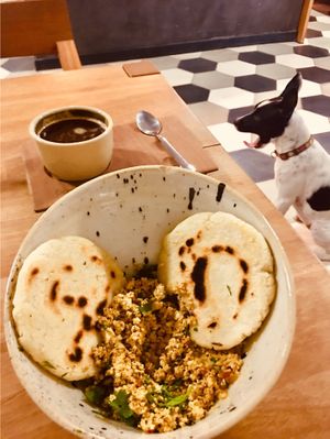 Arepas with delicious tofu scramble. The photo doesn’t do it justice. at Desarrolladores de Cafe in Medellin