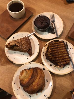 croissant, carrot cake, chocolate muffin, banana bread at Desarrolladores de Cafe in Medellin