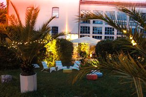 Lounge area just in front of the restaurant terrace. at Restaurantcafe in der ALTEn MÜHLE  in Bad Vilbel