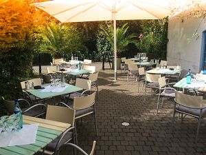Terrace ready for guests. at Restaurantcafe in der ALTEn MÜHLE  in Bad Vilbel